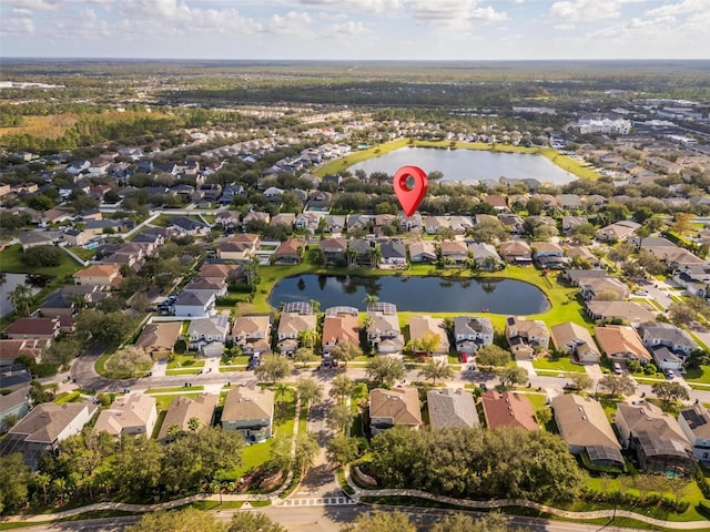 drone / aerial view with a water view