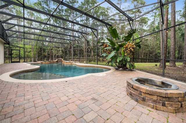 pool with a patio and a lanai