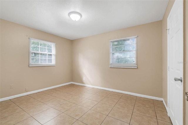 view of tiled spare room