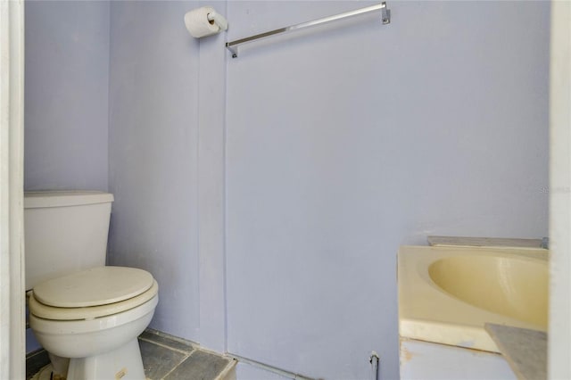 bathroom featuring toilet