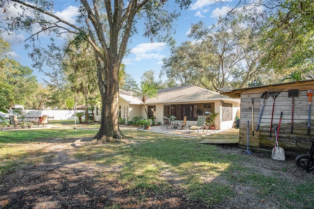 view of yard featuring a wooden deck