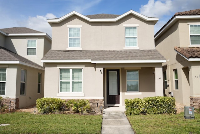 view of front property with a front yard