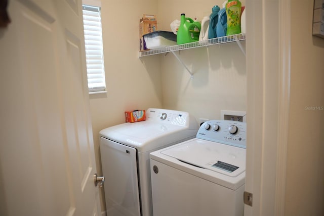 washroom featuring separate washer and dryer