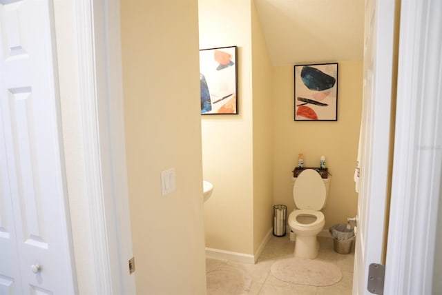 bathroom featuring tile patterned flooring and toilet