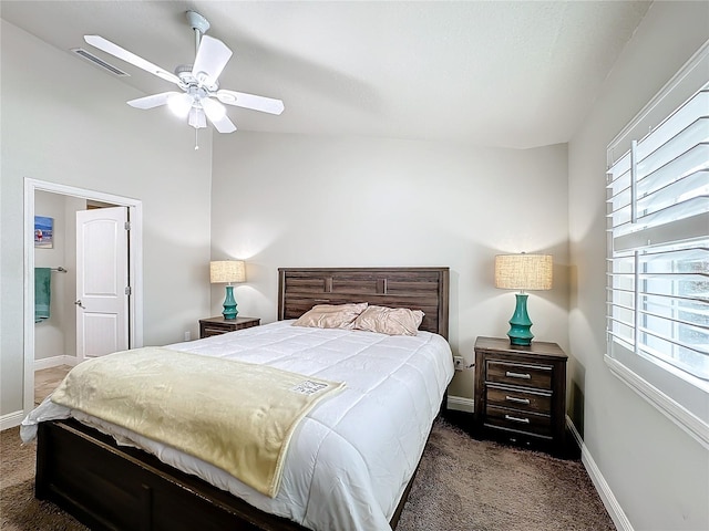 carpeted bedroom featuring lofted ceiling and ceiling fan