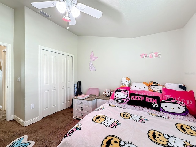 carpeted bedroom featuring a closet and ceiling fan