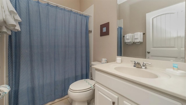 bathroom featuring vanity, tile patterned floors, toilet, and a shower with curtain