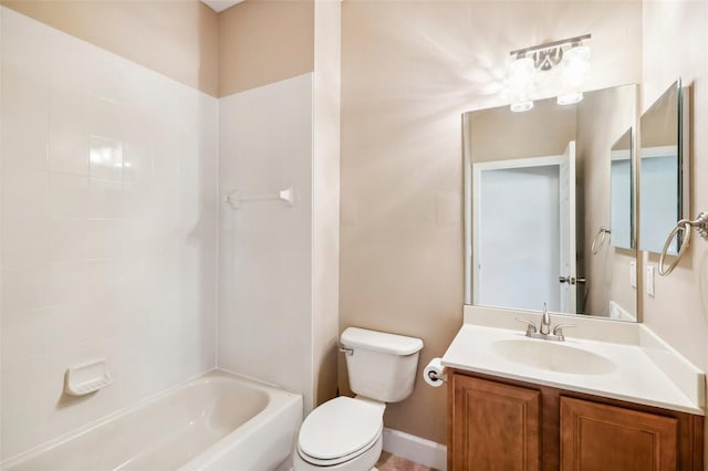 full bathroom with vanity, toilet, and tiled shower / bath