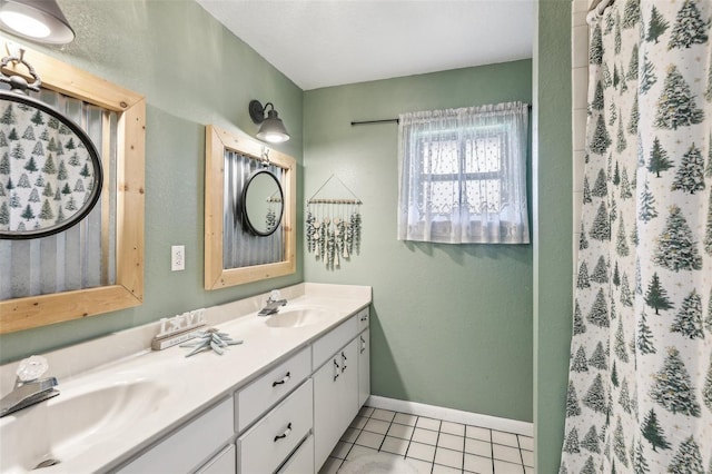 bathroom with vanity and tile patterned floors