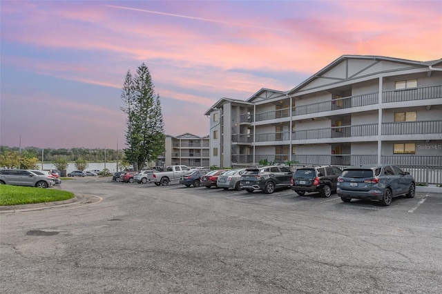 view of outdoor building at dusk