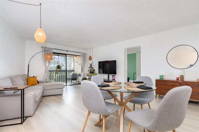 dining room with light wood-type flooring