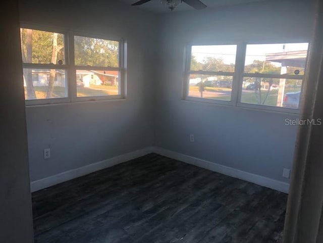 5900 Judy Dee Dr, Orlando, FL 32808 - unfurnished room with ceiling fan, baseboards, and dark wood-type flooring