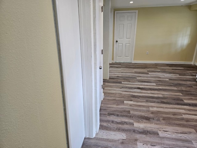 hall with dark wood-type flooring