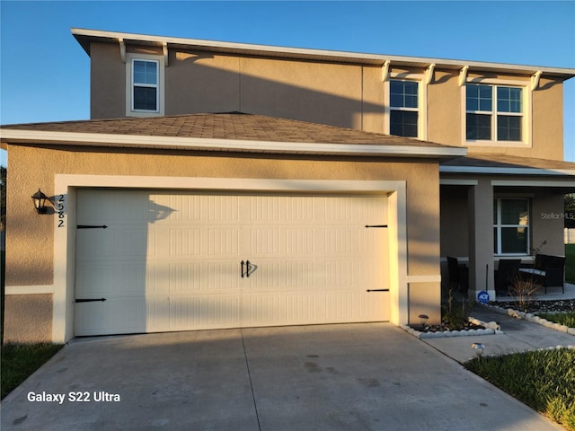 view of front of property with a garage