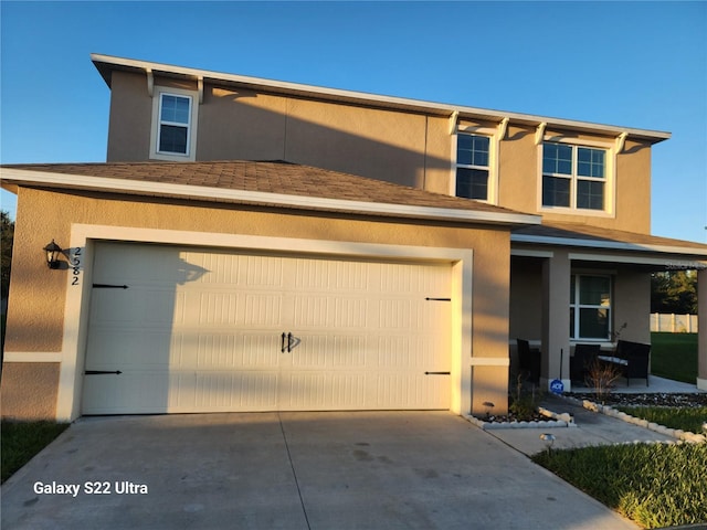 view of front of home with a garage