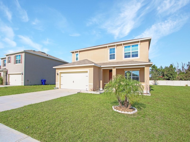 view of front of property with a garage and a front lawn