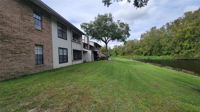 view of yard with a water view