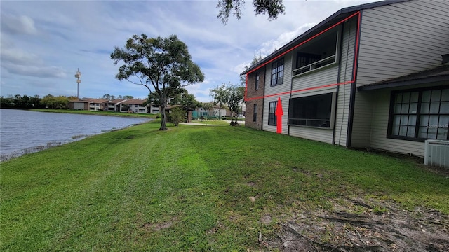 view of yard with a water view