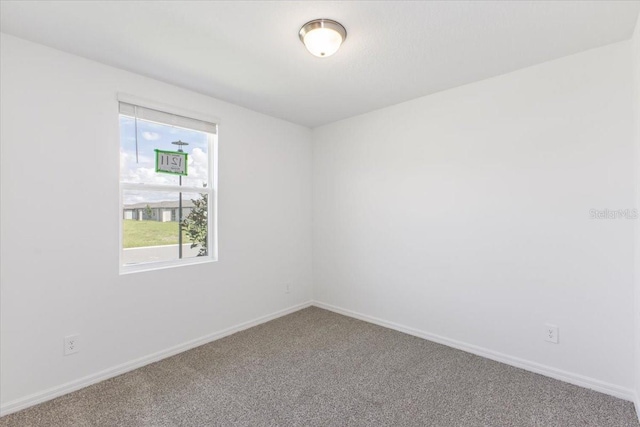 view of carpeted spare room