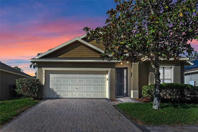 view of front of property featuring a garage