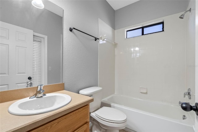 full bathroom with vanity, toilet, and shower / washtub combination