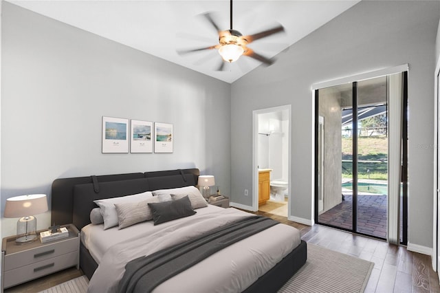 bedroom featuring ensuite bathroom, access to outside, ceiling fan, hardwood / wood-style floors, and lofted ceiling