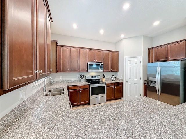 kitchen with sink and stainless steel appliances