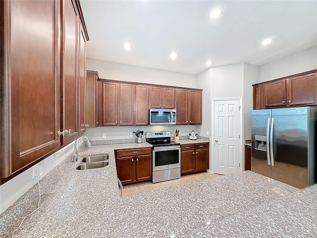 kitchen with sink and stainless steel appliances