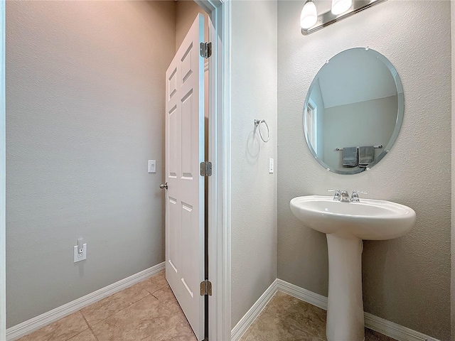 bathroom featuring tile patterned floors and sink