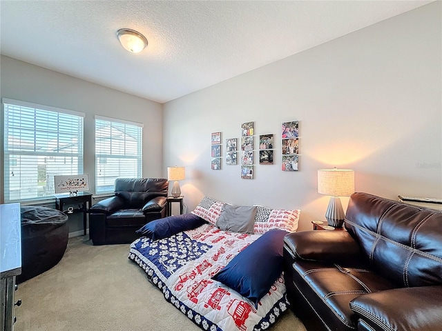 carpeted bedroom featuring a textured ceiling