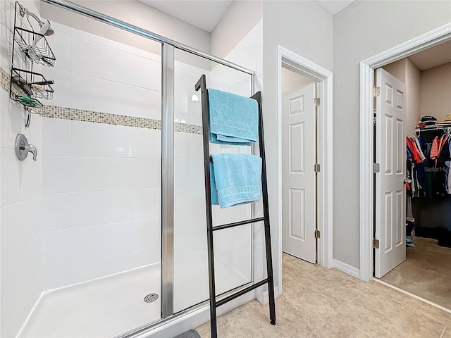 bathroom featuring an enclosed shower