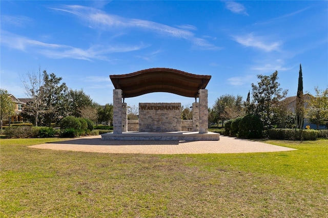 view of community featuring a lawn