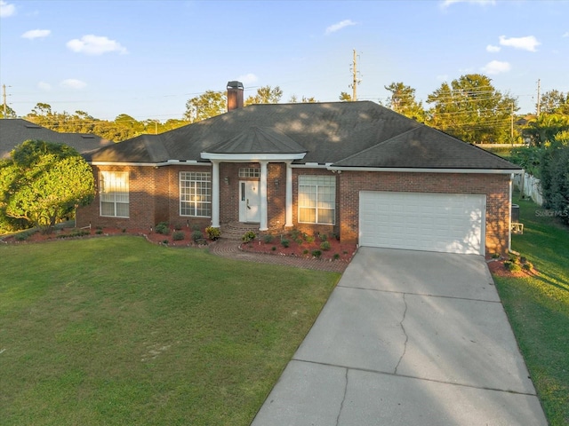 single story home with a front lawn and a garage