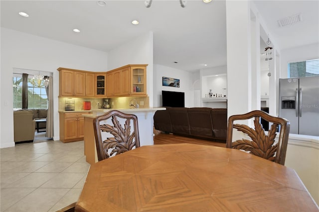 dining room featuring light tile patterned floors