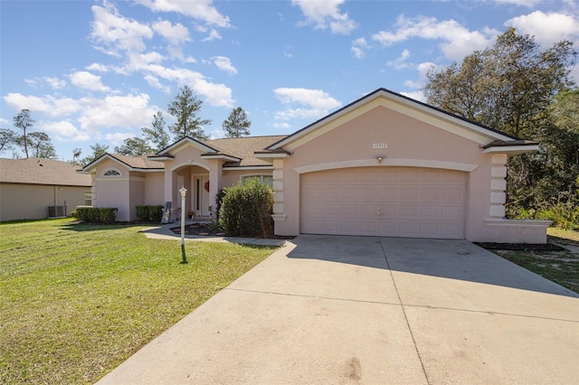 single story home with a front yard, a garage, and central air condition unit