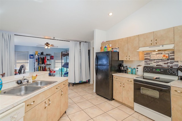 kitchen with light tile patterned floors, white appliances, sink, and light brown cabinetry