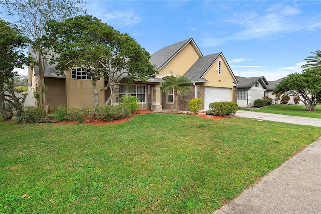 view of front of home featuring a garage and a front lawn