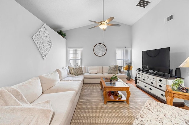 12512 Tillingham Ct SW, Orlando, FL 32837 - living area with ceiling fan, wood finished floors, and high vaulted ceiling