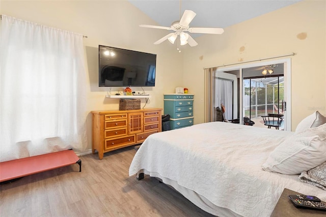 bedroom with access to exterior, light hardwood / wood-style floors, and ceiling fan