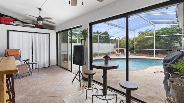 view of swimming pool with ceiling fan