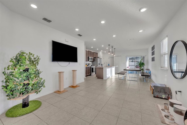 tiled living room with sink