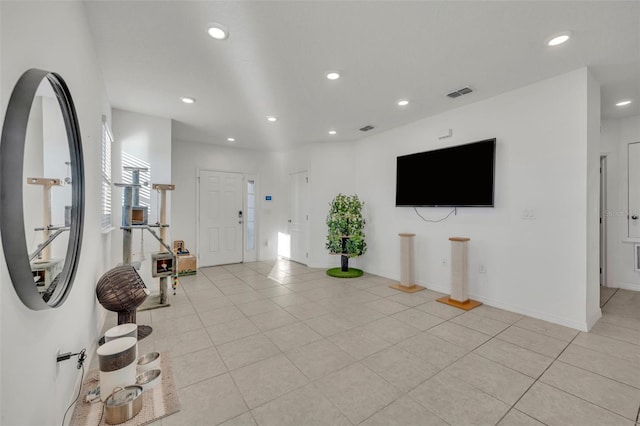 interior space featuring light tile patterned flooring