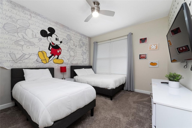 bedroom with ceiling fan and dark carpet