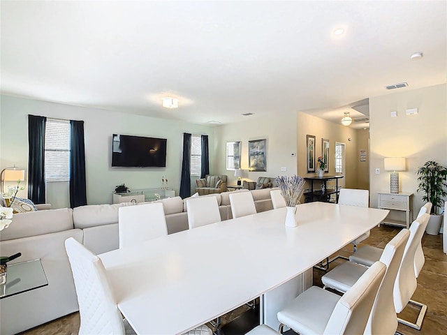 dining space with a healthy amount of sunlight