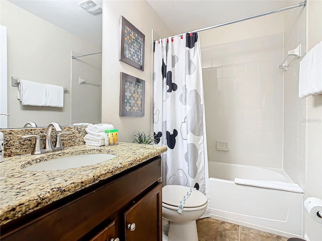 full bathroom featuring tile patterned floors, shower / bath combo, toilet, and vanity