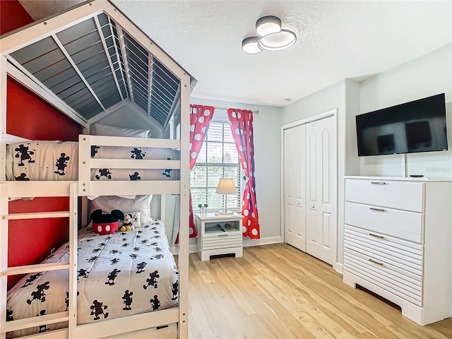 bedroom featuring a closet and hardwood / wood-style floors