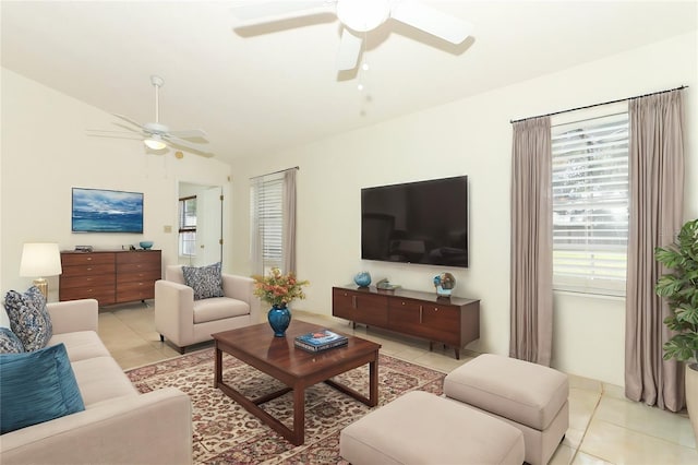 tiled living room featuring lofted ceiling and ceiling fan