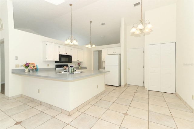 kitchen with black appliances, light tile patterned floors, pendant lighting, white cabinets, and kitchen peninsula