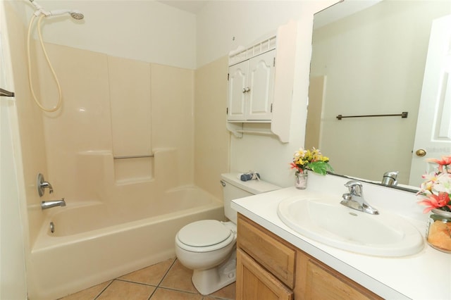 full bathroom featuring tile patterned flooring, washtub / shower combination, toilet, and vanity