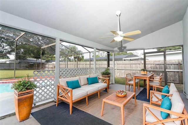 sunroom / solarium with vaulted ceiling and ceiling fan